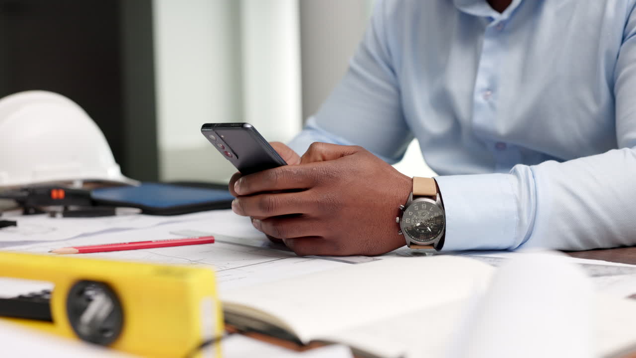 Phone, hands and communication with an architect