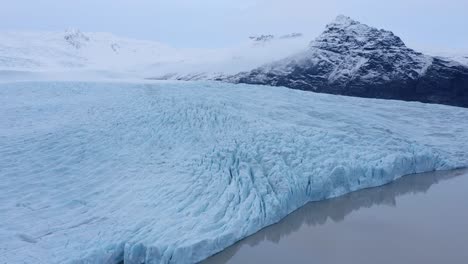 fjallsárlón iceberg lagoon at vatnajökull glacier national park in iceland - aerial drone shot