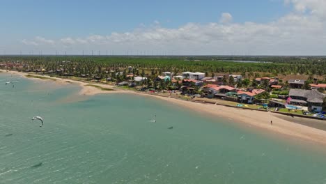 Wide-drone-shot-of-the-Ilha-do-Guajiru-lagoon-with-kitesurfers