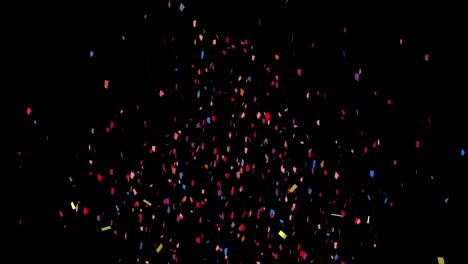 animation of golden and colorful confetti falling against copy space on black background