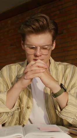 young man studying