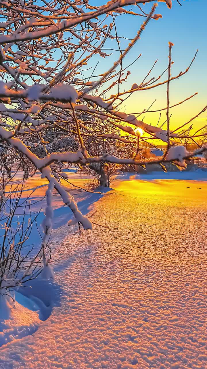 Sunset timelapse cold winter afternoon frozen nature snow covered rural village