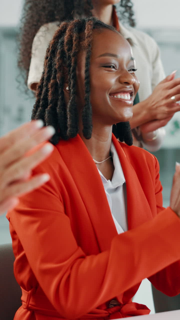 Happy Black Businesswoman Clapping and Smiling in Office
