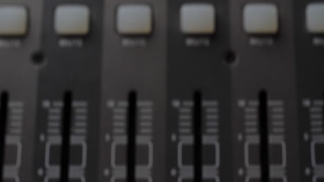 Digital-audio-console.-Motorized-sliders.-Close-up