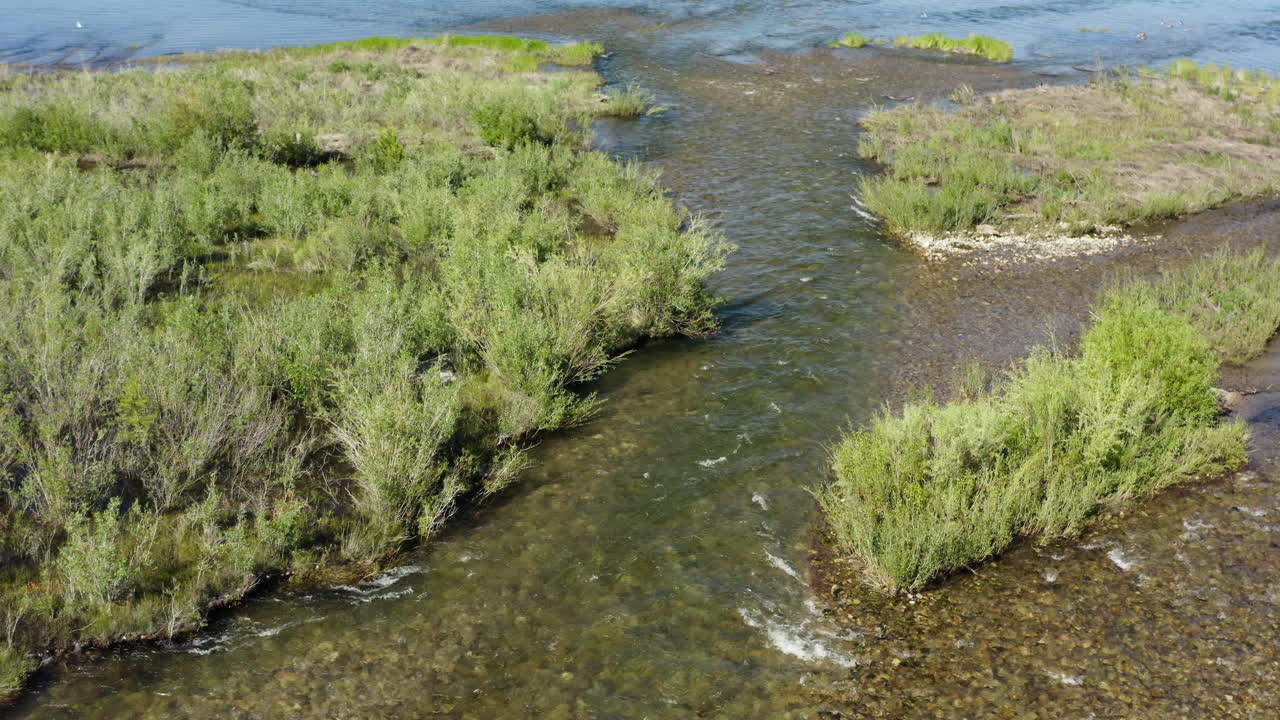 Lush meadows and rushing rivers of Mono Lake in summertime