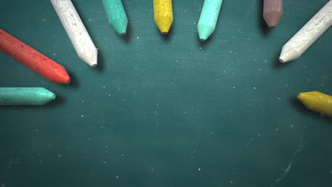 Closeup-colorful-chalk-on-blackboard-school-background-of-education-theme