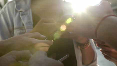 Closeup-shot-of-hands-using-smartphones.