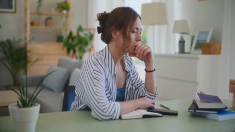 Sad-Unsuccessful-Businesswoman-Sitting-at-Desk