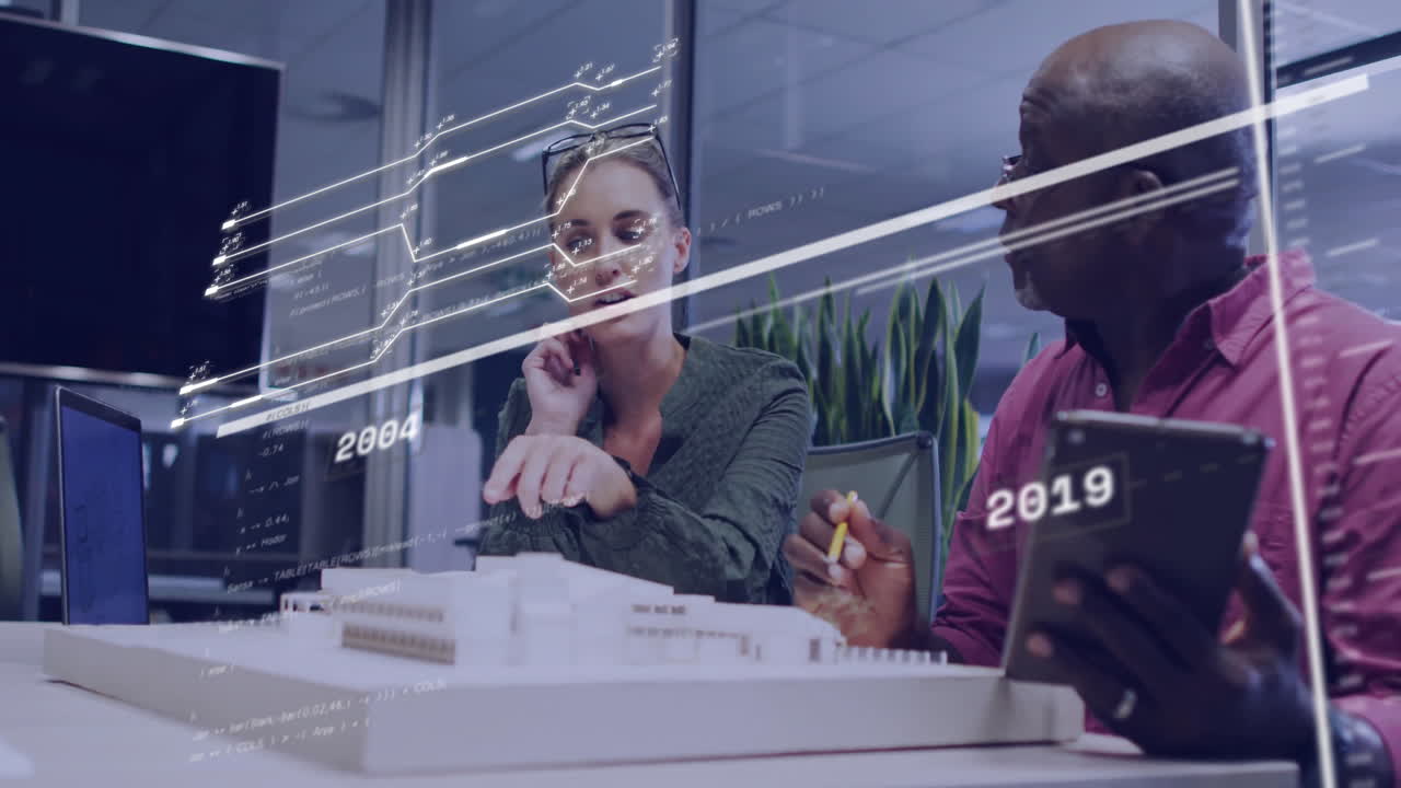 Animation of data processing and diagrams over diverse colleagues discussing work