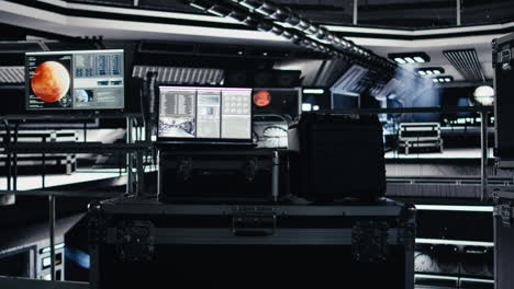 laptop inside high tech spaceship displaying mars planetary surface analytics