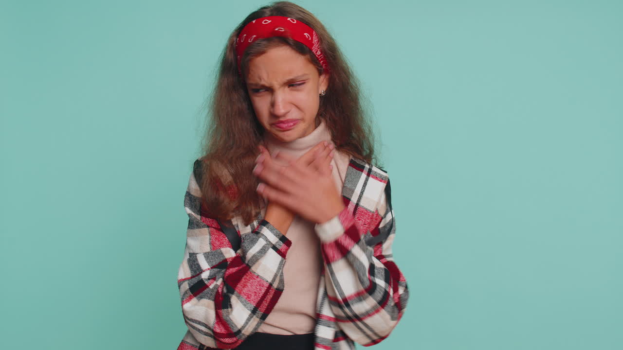 Unhealthy girl coughing covering mouth with hand, feeling sick, allergy or viral infection symptoms