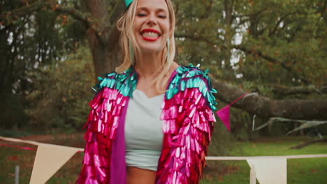 woman celebrating a birthday in a park