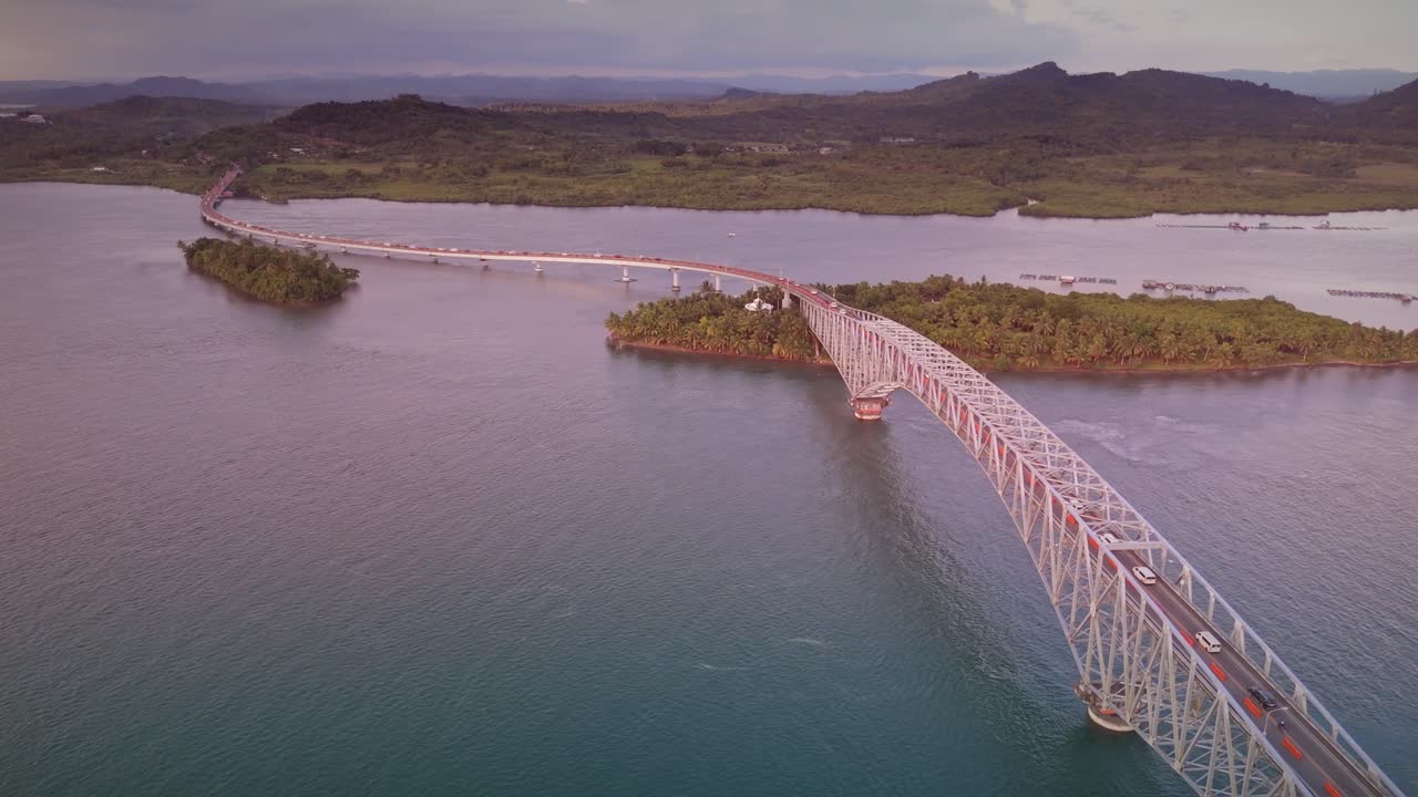 Golden hour over the San Juanico Bridge with gridlocked one way traffic