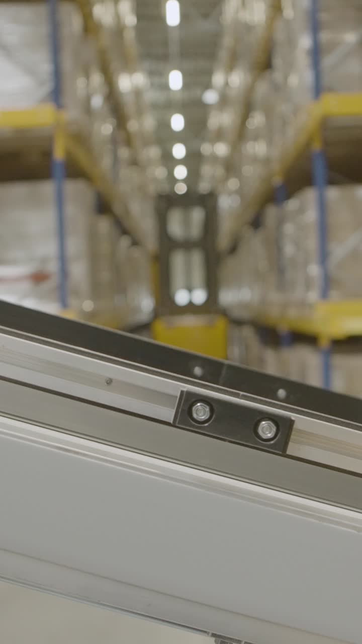 Conveyor belt in a warehouse with boxes. Efficient, industrial, organized