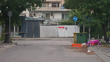 abandoned construction materials, furniture, boxes and clothes near a dumpster in sofia, bulgaria