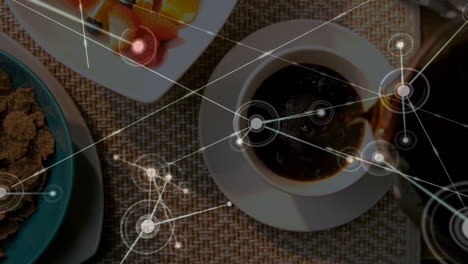 flat design showing overhead breakfast with coffee cup, fruit skewers and network graphics