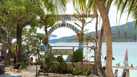 welcome to the mystery island, vanuatu entrance sign.
