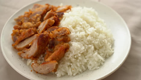 fried pork topped on rice with spicy dipping sauce