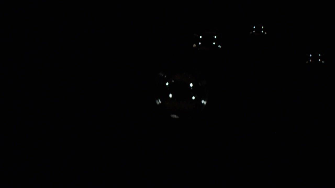 Glowing Soap Bubbles at Night