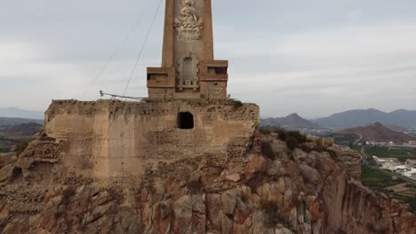 huge christ statue top of a hill in monteagudo, near murcia city