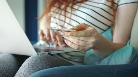 close up video of young woman doing e-shopping at home