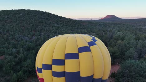 hot air balloon getting ready for flight in sedona, arizona - drone shot