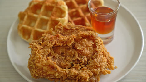 homemade fried chicken waffle with honey or maple syrup