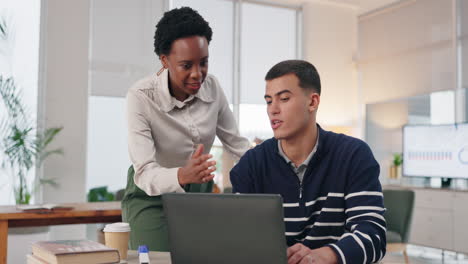 two colleagues working together in an office