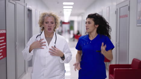 doctors and nurses running in hospital corridor