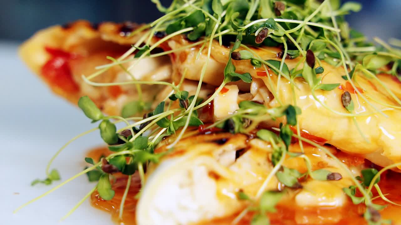 Advertising food. Delicious dish with healthy green sprouts. Yummy pita ready to eat. Beautiful decoration of meal in the restaurant. Macro shot