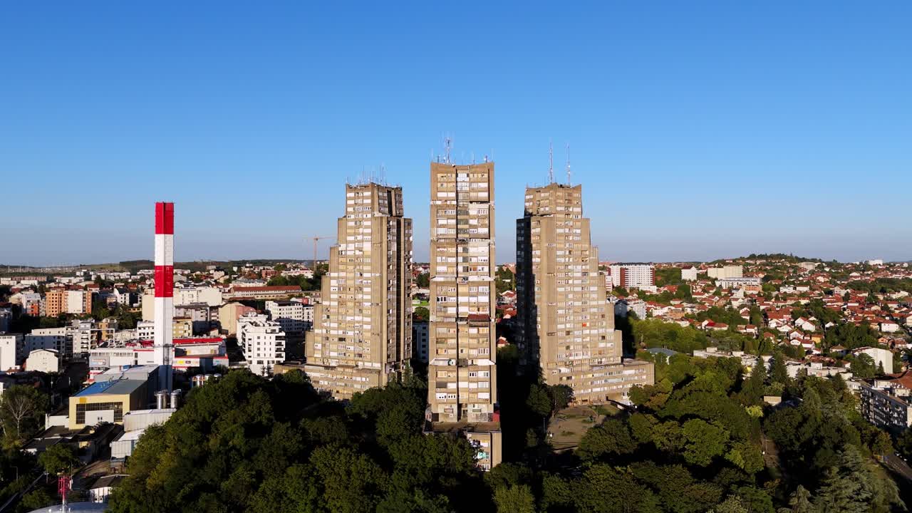 Drone footage of the Eastern Gate of Belgrade, Serbia three towering brutalist buildings forming a striking concrete landmark above the city’s urban landscape