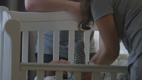 parents with newborn baby