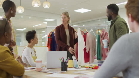 diverse group of male and female business colleagues working in office