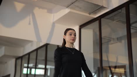 woman doing stretching exercises in a fitness studio