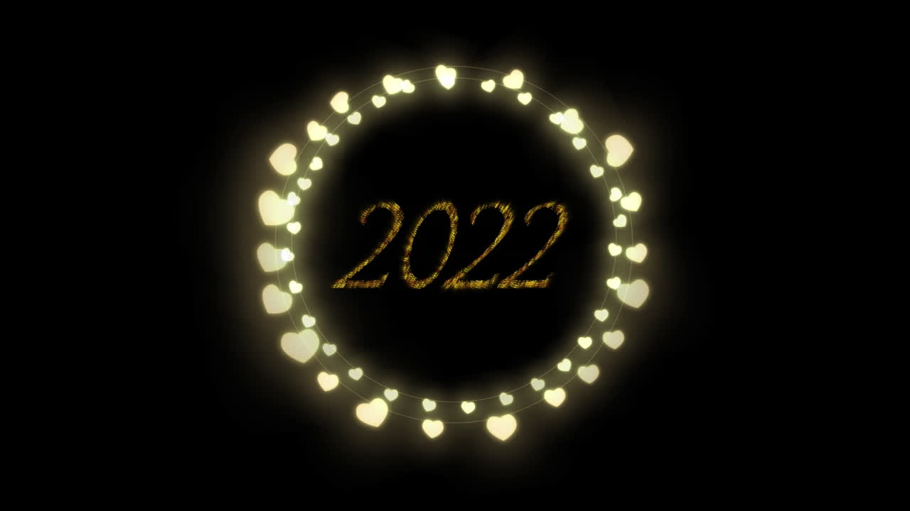 animación de 2022 texto en oro con celebración de año nuevo corazones luces de hadas sobre fondo negro