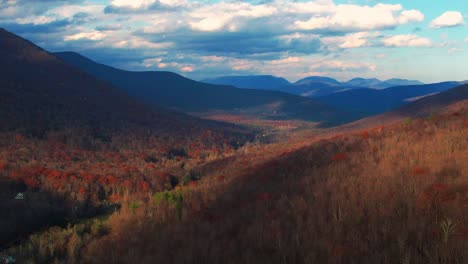 aerial drone video footage of the magical, beautiful appalachian mountains during fall autumn with beautiful golden light and skies