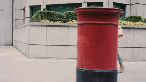 beautiful mixed race business woman walking through city