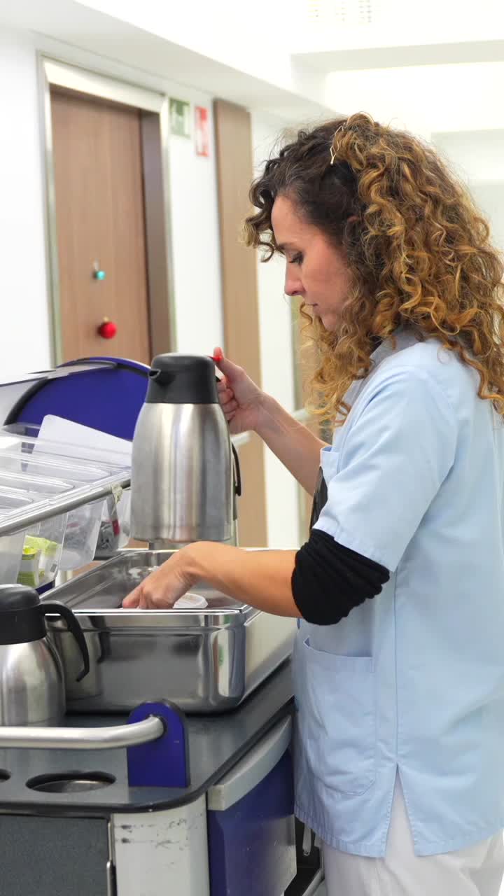Nurse pouring beverage into a cup