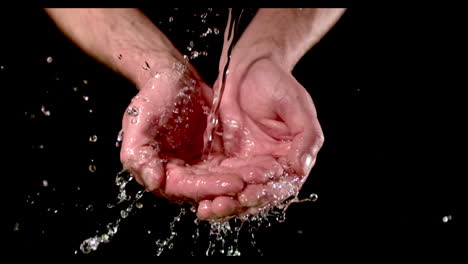 man washing hands