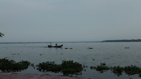 vembanad lake,sunset,moving water