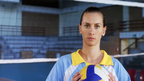 Female-player-holding-volleyball-in-the-court-4k