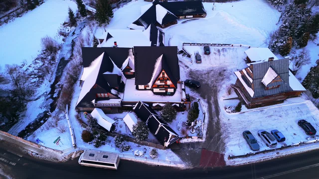 Slow cinematic aerial reveal, Zakopane town location, transportation