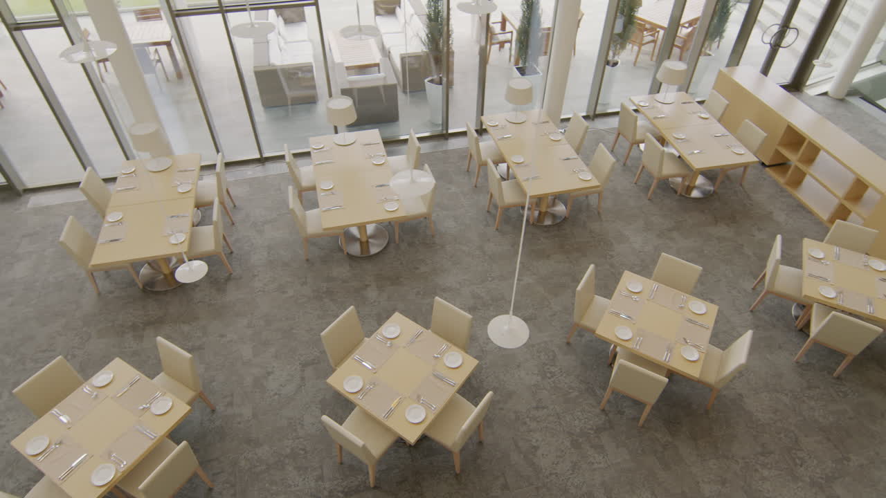 Overhead view of an empty modern restaurant dining area