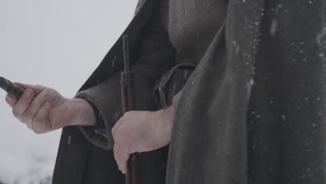 soldier preparing with wepaons vintage historical knife in cover for battle, world war one