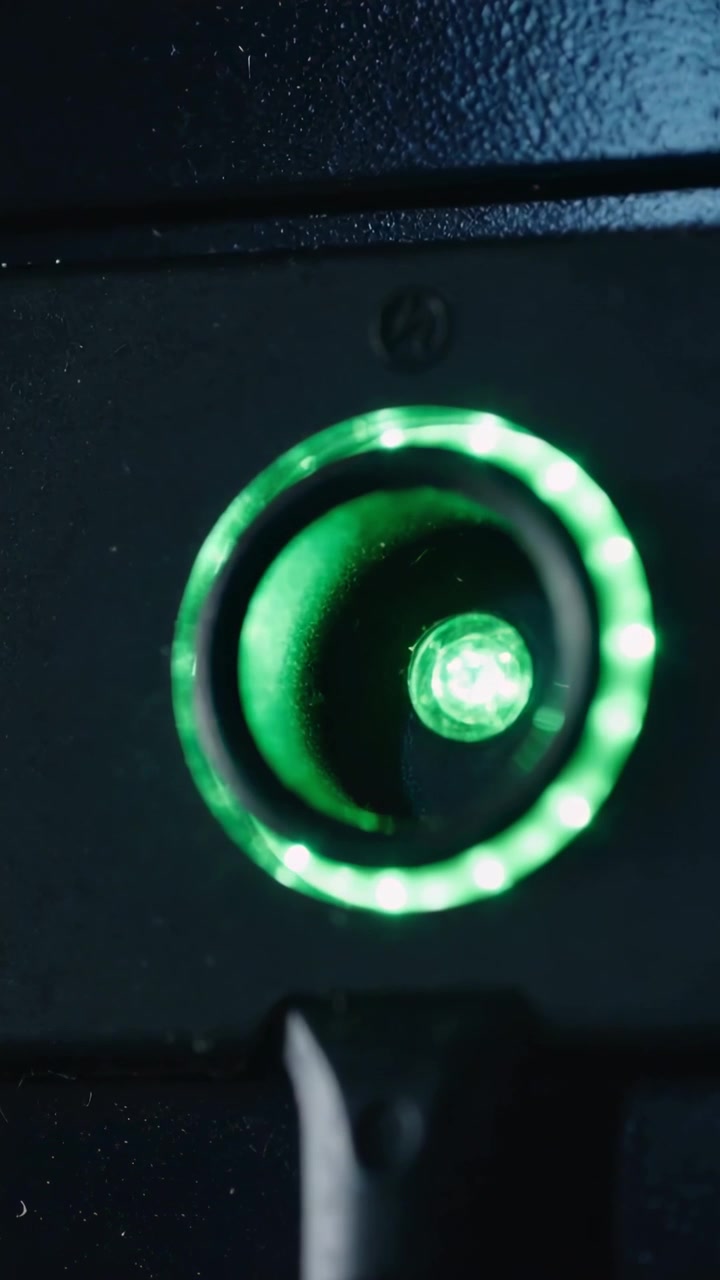 Vertical video: Centering camera, green ring LED and central diode pulsing on panel, showing status