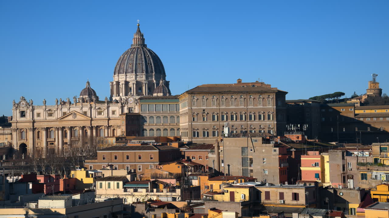 Aerial view of Vatican city from the distance. Saint Peter's Basilica at sunset. Zoom in effect. Rome, Italy