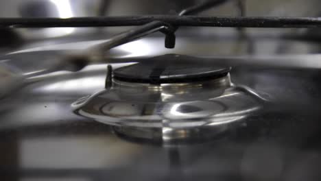 Closeup-of-turning-off-an-old-motorhome-gas-cooker