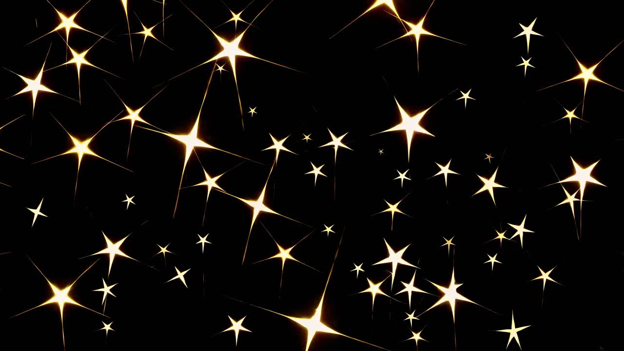A video featuring a top-down view of glowing stars against a black background, creating a dreamy