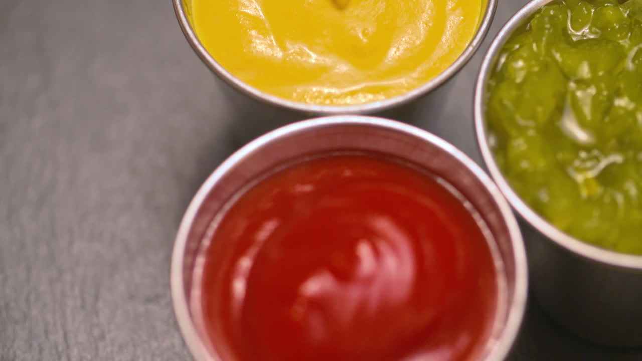 Detailed orbit of condiments, ketchup, mustard, and relish