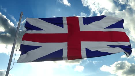 bandera del reino unido soplando en el viento en cámara lenta contra un cielo azul claro